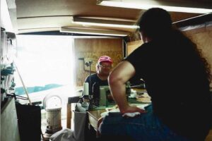Mark-Minor-and-father-working-in-mobile-canvas-shop